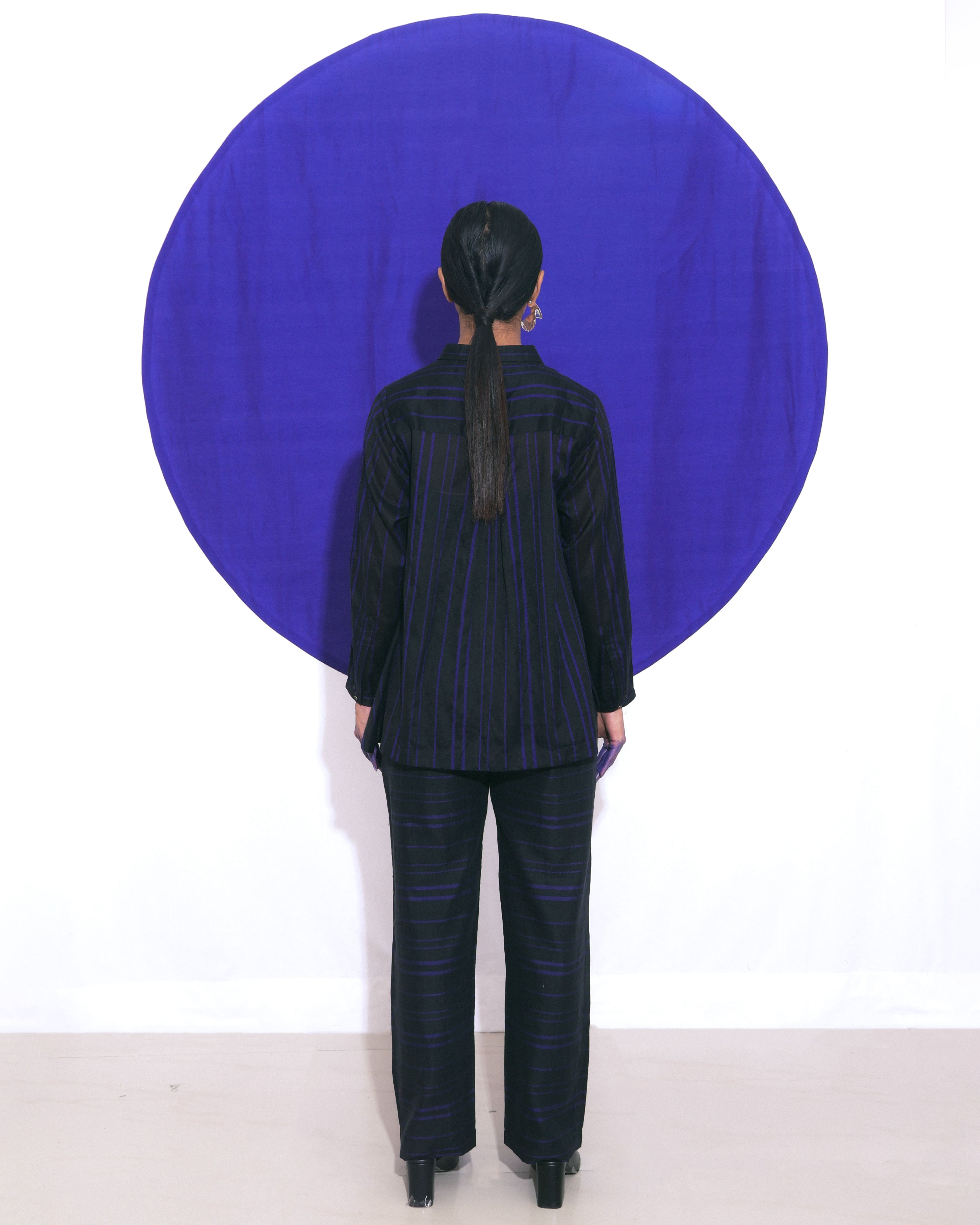 Shoonyata Abyss Shirt Crafted from handwoven silk using traditional techniques. The design features a classic collar with a buttoned placket, complemented by full-length sleeves for a polished look.
