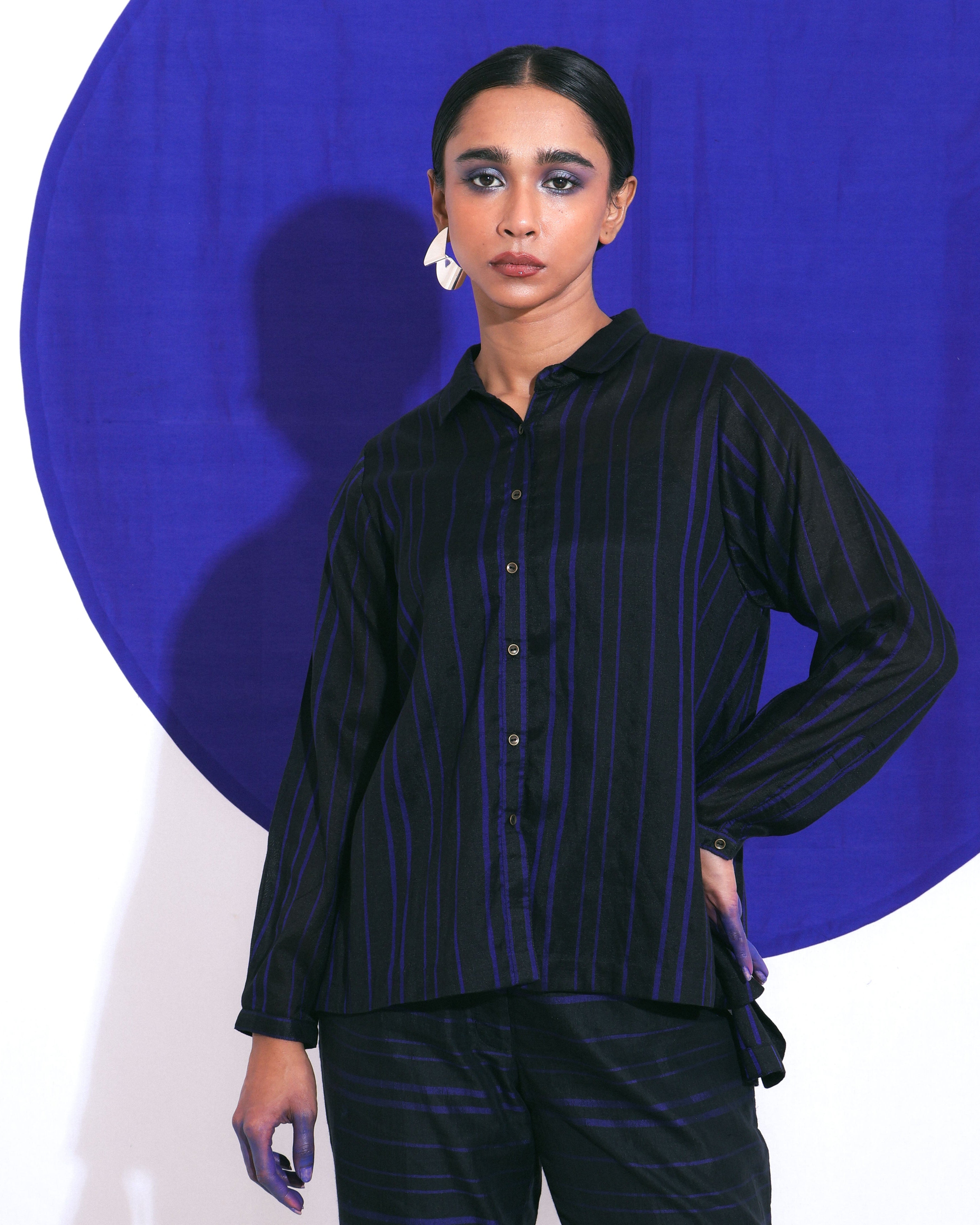 Shoonyata Abyss Shirt Crafted from handwoven silk using traditional techniques. The design features a classic collar with a buttoned placket, complemented by full-length sleeves for a polished look.