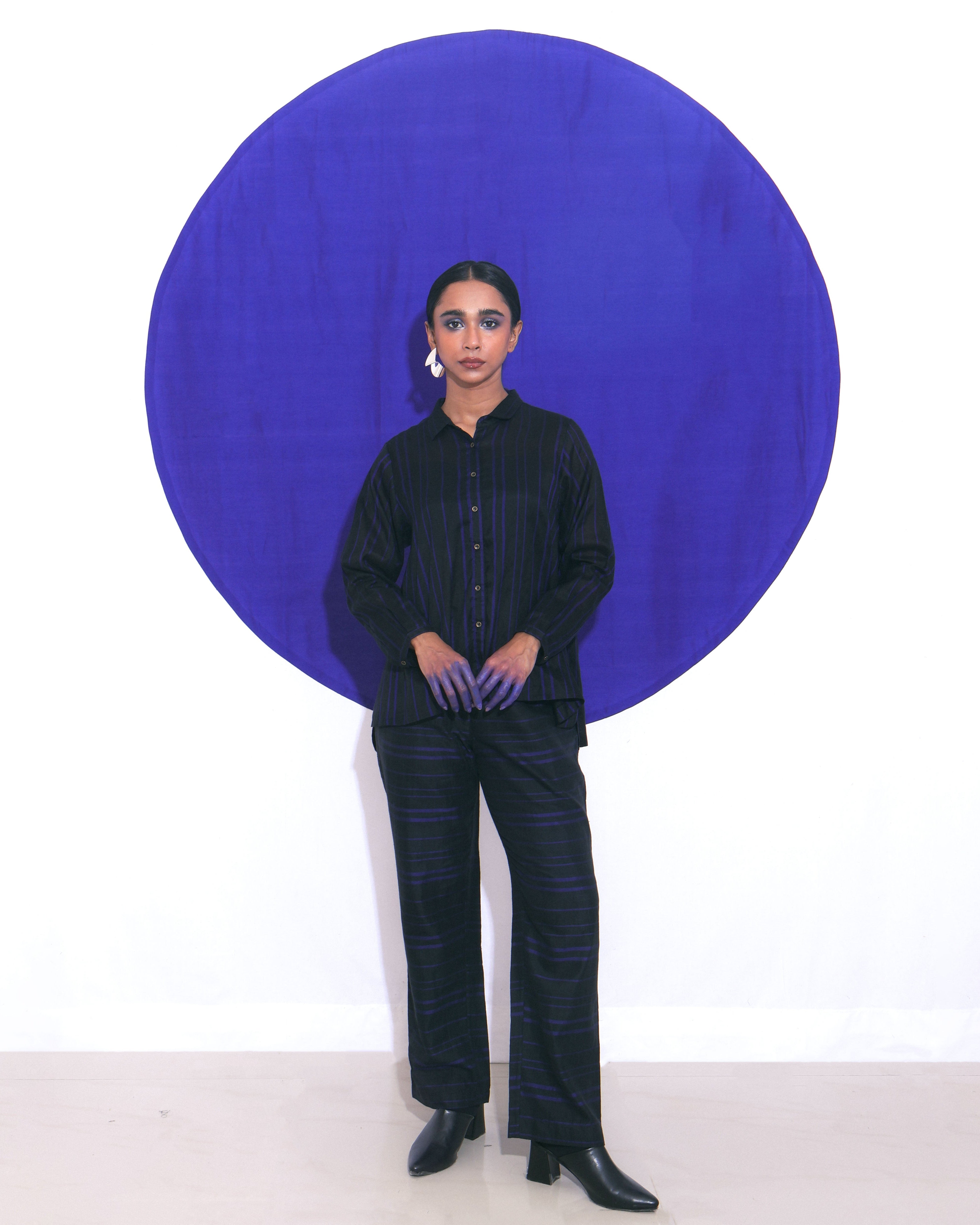 Shoonyata Abyss Shirt&nbsp; Crafted from handwoven silk using traditional techniques. The design features a classic collar with a buttoned placket, complemented by full-length sleeves for a polished look.