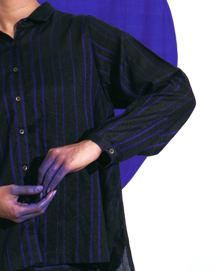 Shoonyata Abyss Shirt&nbsp; Crafted from handwoven silk using traditional techniques. The design features a classic collar with a buttoned placket, complemented by full-length sleeves for a polished look.